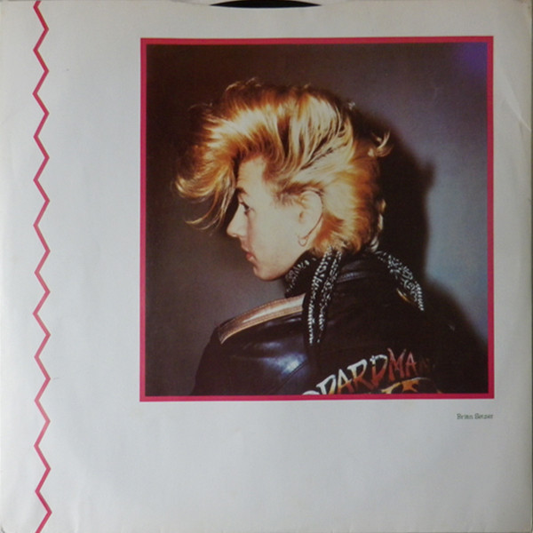 Portrét Briana Setzera na vnitřním obalu alba Stray Cats (1981, Arista Records)